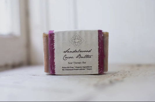 Sandalwood Cocoa Butter Experience the rejuvenating properties of our Sandalwood Cocoa Butter Scar Therapy organic soap