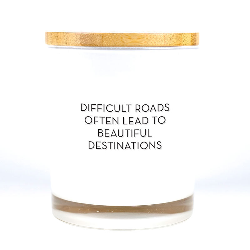 Our timeless and classic Signature Candles provide any home with a beautiful decor item while filling the room with a beautiful fragrance! These vessels also serve as a base for all our printed affirmation designs and are 100% Soy Based. Difficult Roads Often Lead To Beautiful Destinations Candle was created to inspire our customers with a meaningful quote so they can be reminded to stay positive throughout the day.