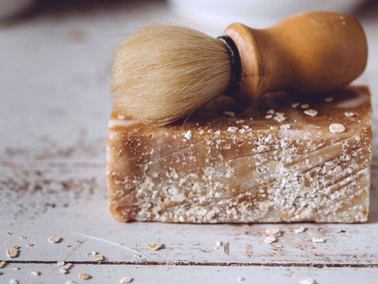 Amoré Organic Soap has crushed steel cut oatmeal within and sprinkled on top. This soap has a "woodsy rummy" aroma but it is so subtle and refreshing that it is one of my most popular for men.