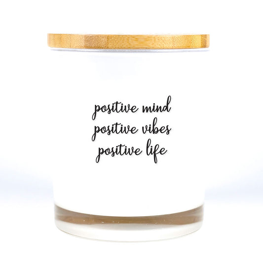 Our timeless and classic Signature Candles provide any home with a beautiful decor item while filling the room with a beautiful fragrance! These vessels also serve as a base for all our printed affirmation designs.  Positive Mind Positive Vibes Positive Life Candle was created to inspire our customers with a meaningful quote so they can be reminded to stay positive throughout the day.