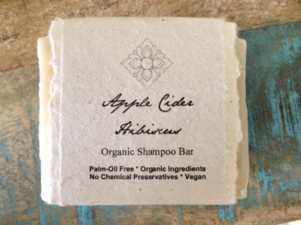 Apple Cider Hibiscus Organic Shampoo Bar helps strengthen and hydrate hair, creating shinier and healthier hair