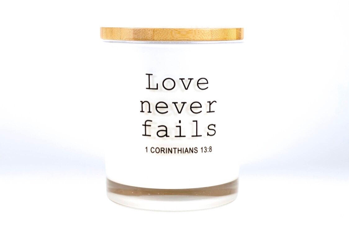 Our timeless and classic Signature Candles provide any home with a beautiful decor item while filling the room with a beautiful fragrance! These vessels also serve as a base for all our printed affirmation designs and are 100% Soy Based.   Love Never Fails Candle was created to inspire our customers with a meaningful quote so they can be reminded to stay positive throughout the day.