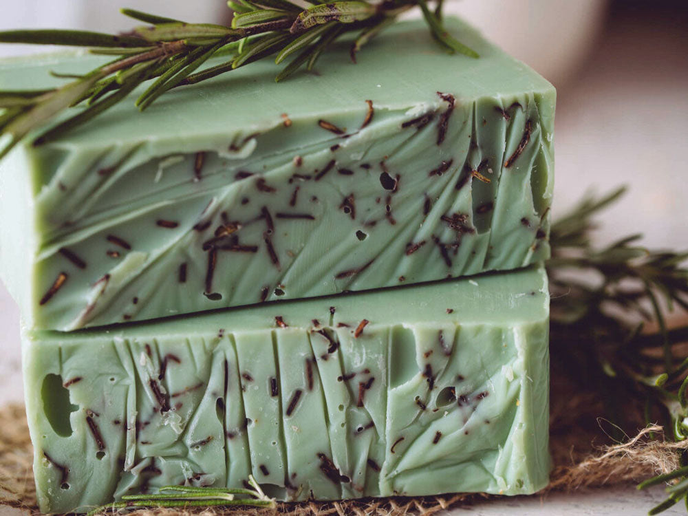 Crushed Flaxseeds within and sprinkled with dried rosemary on top, this Rosemary Mint Organic Soap smells like an "After Hours" mint even though there is no chocolate